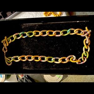 Alexis Bittar silk fabric necklace over metal chain links. Long length.